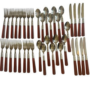 Pier One 39 Piece Stainless Flatware Red Acrylic Handles Mod Floral Embossed